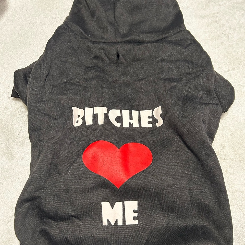 Black Hoodie with Red Heart Graphic